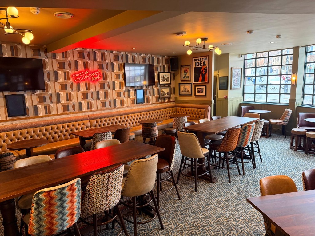 Completed — banquette and gallery wall detail