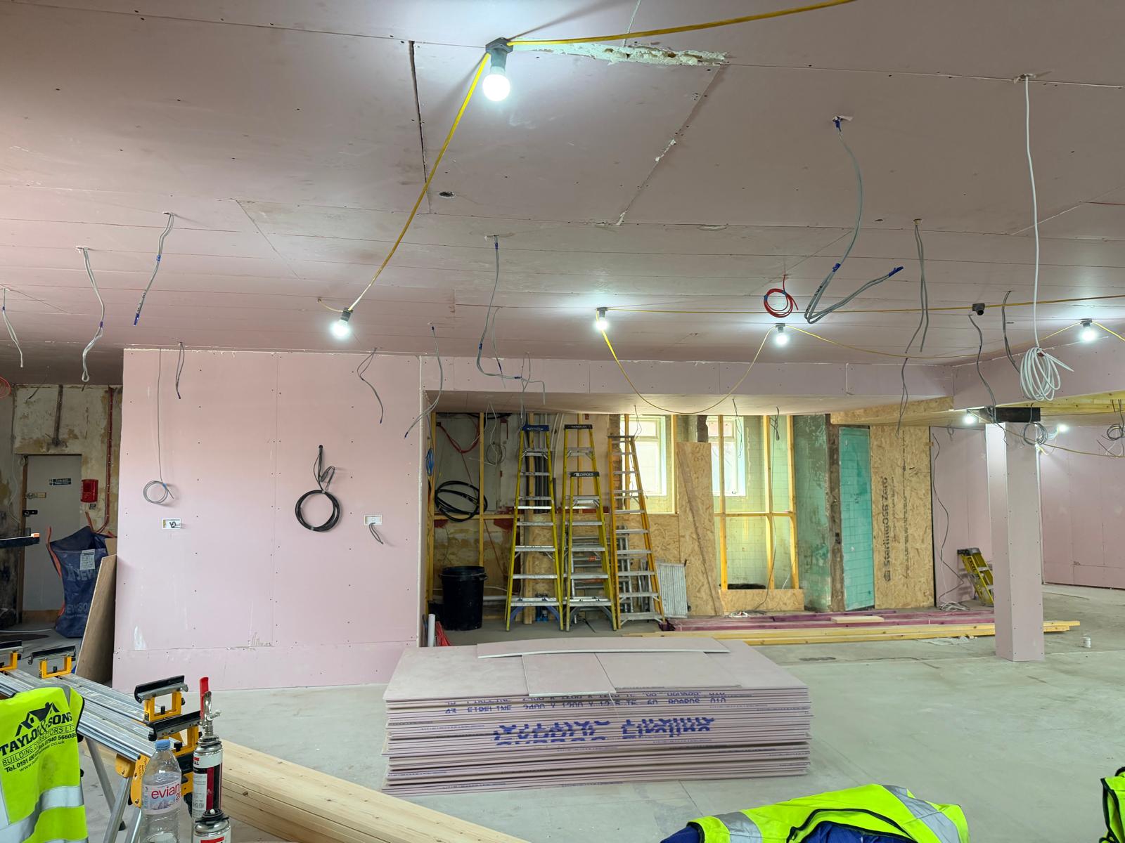 Update 24 July — boarded lounge with first-fix wiring and temporary lighting
