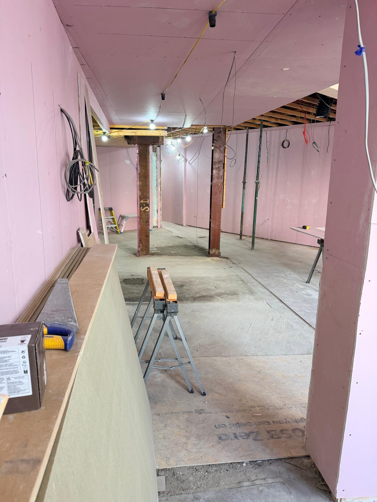 Update 24 July — boarded bar area with props and electrical rough-in